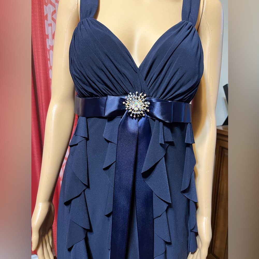 Navy blue cocktail dress w/ snowflakes look pin. Side zipper, ruffles, soft.